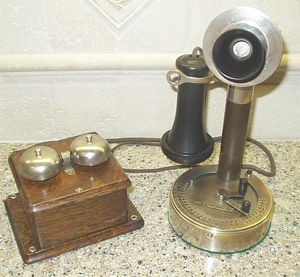 couch autophone antique candlestick telephone