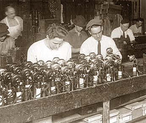 Men working with candlesticks telephones at Chesapeake and Potomac Telephone in Washington DC date unknown