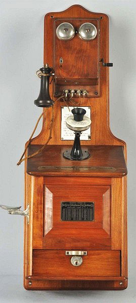 Gray Silver Dollar Pay Telephone