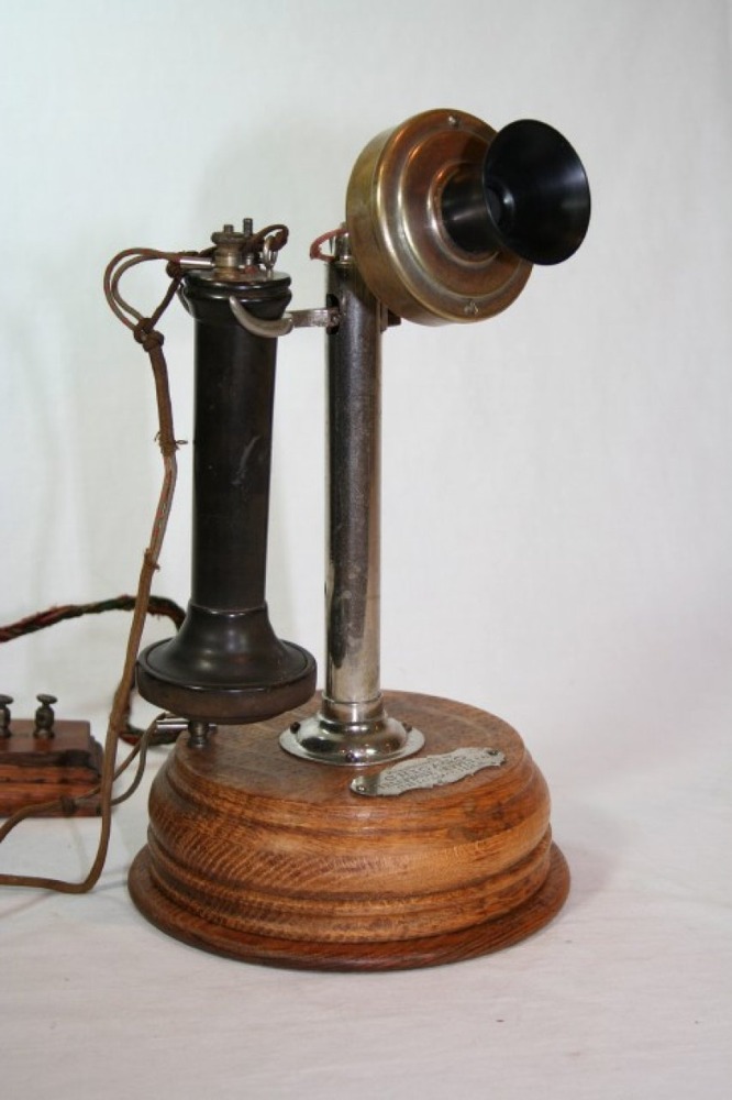Chicago Telephone Supply Co. straight shaft on a wooden base
