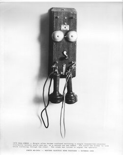 Wall phone with two butterstamp receiver/transmitters